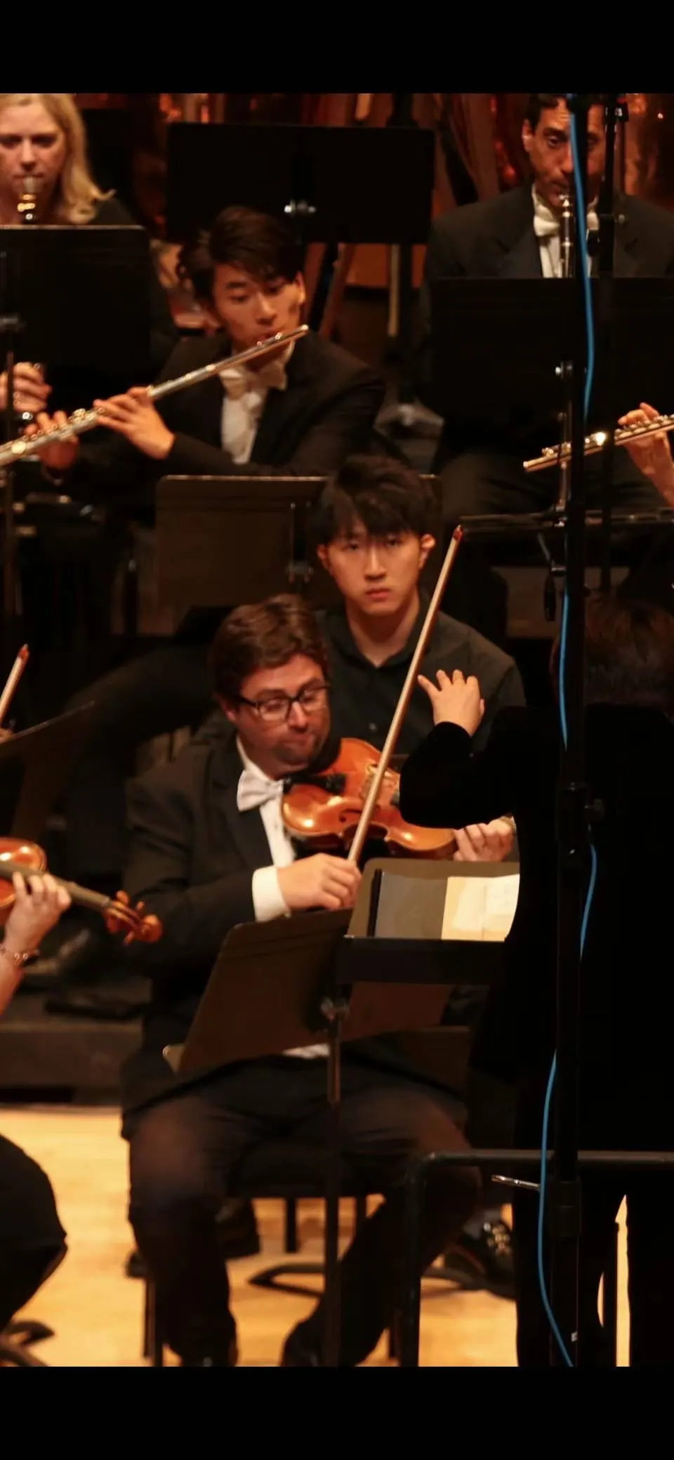 Musicians in the orchestra mid-performance
