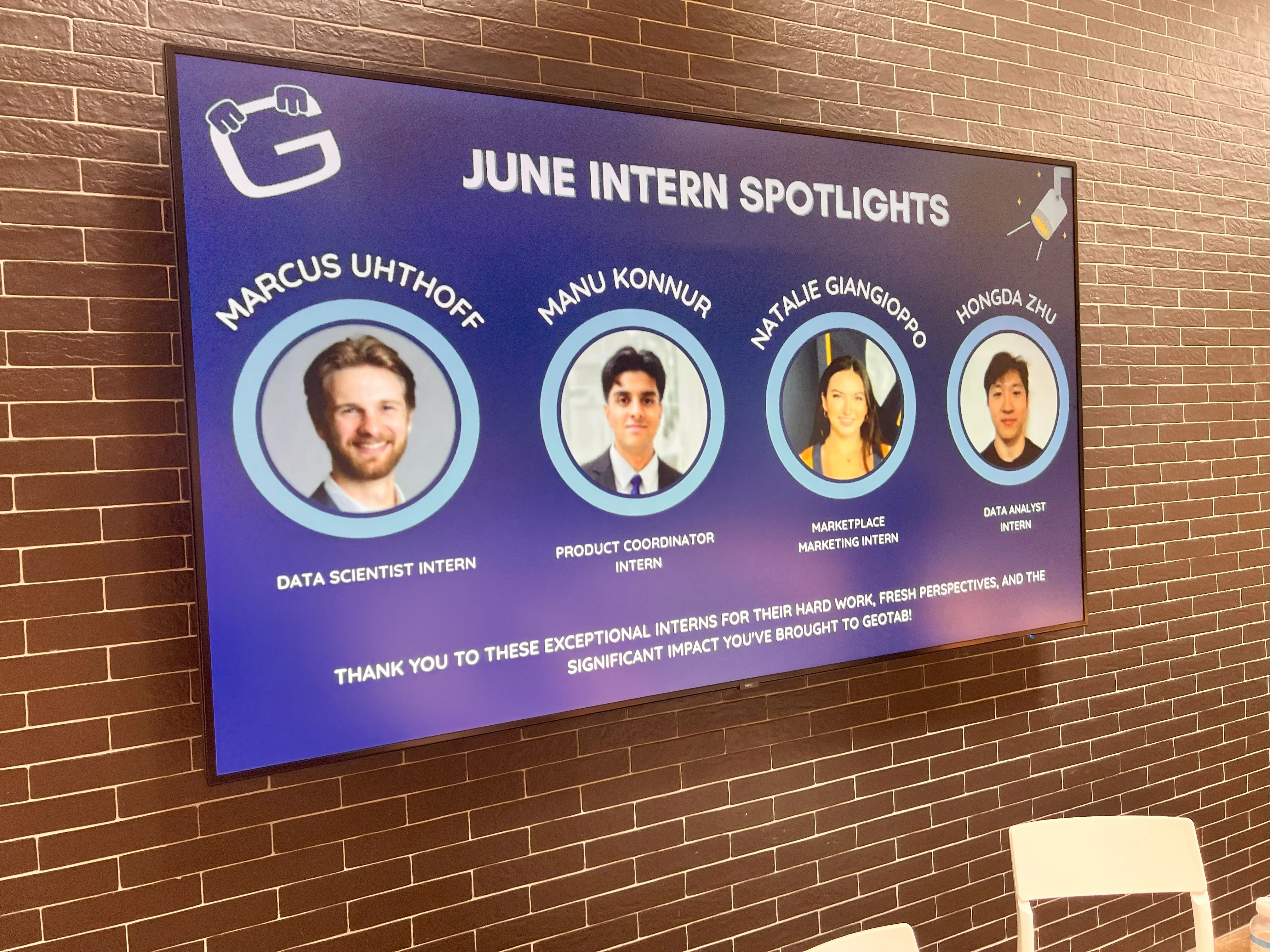 An office screen showing the June intern spotlights