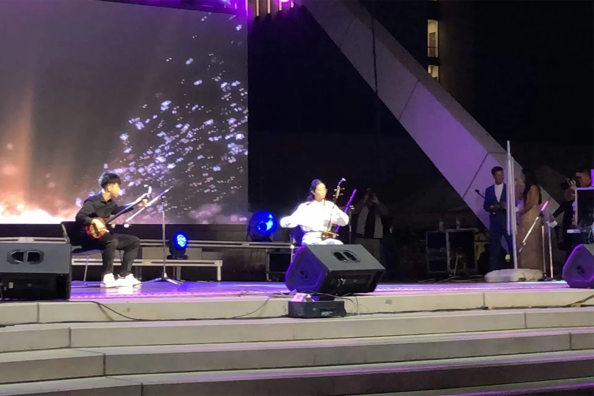 Wide shot of the sanxian performance on the festival stage