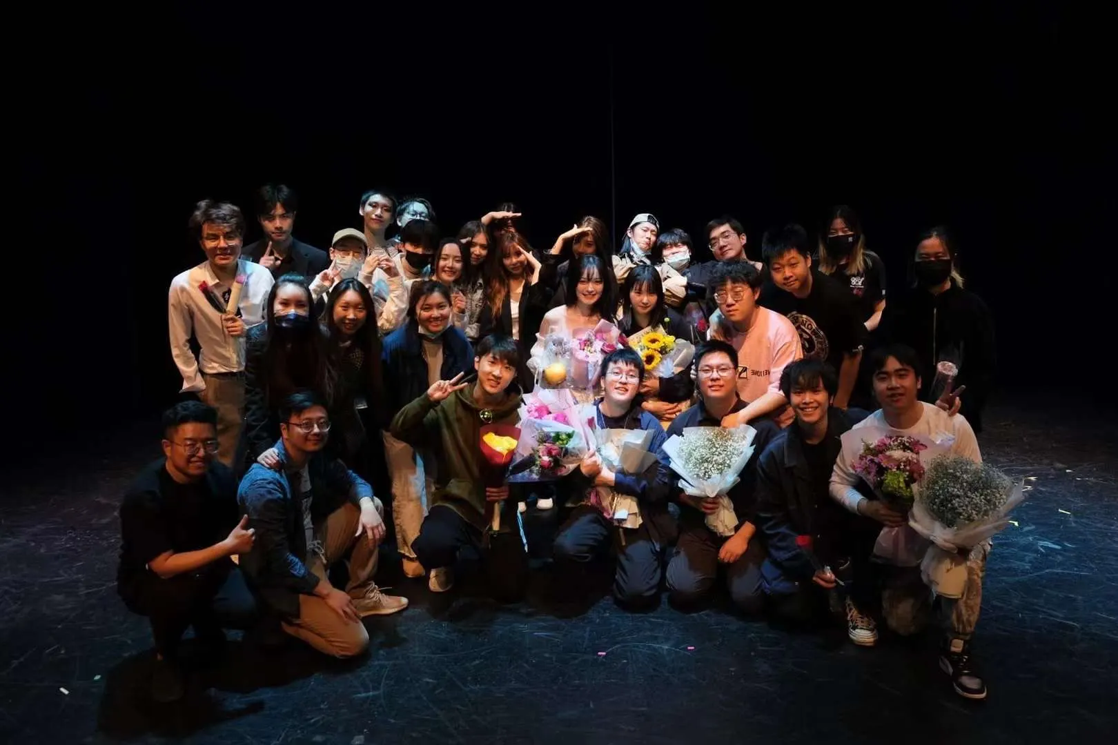 Drama club on stage at the curtain call