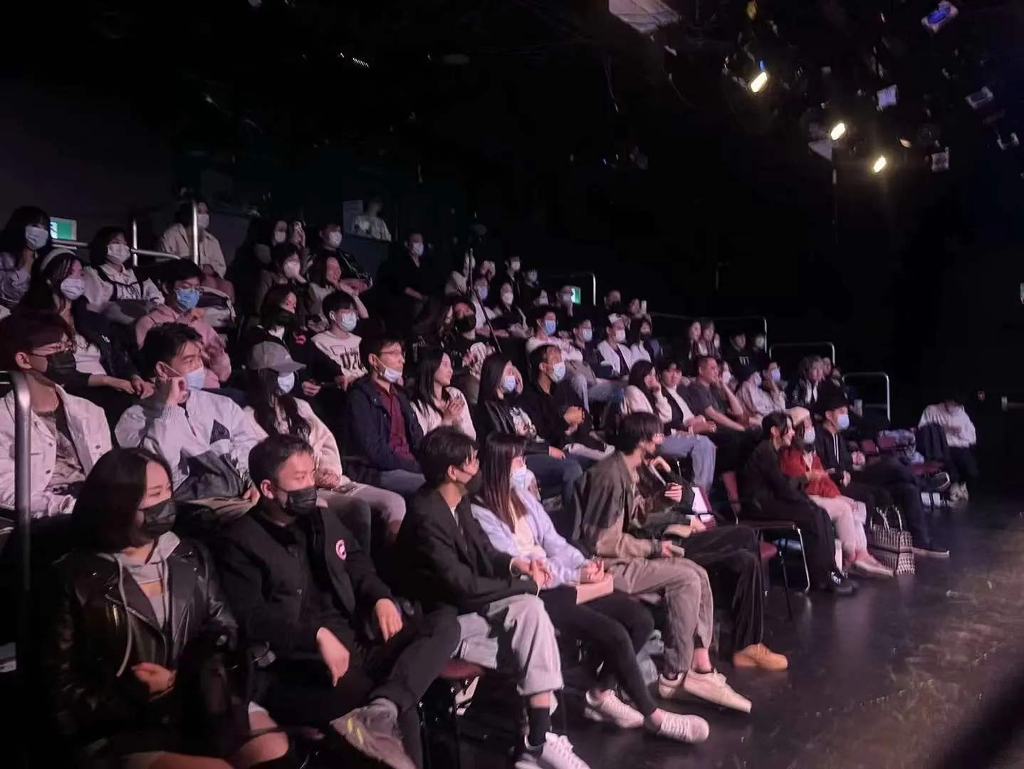 The audience filling the theatre before the show