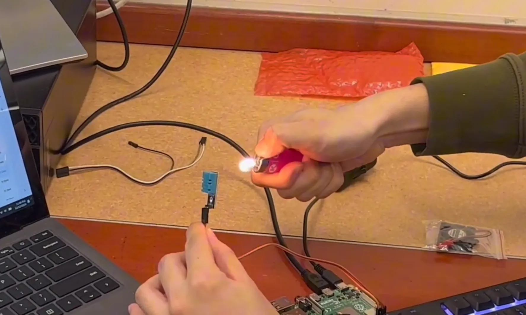 Heating the DHT11 with a lighter to trip the temperature alert